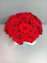 Фото флориста 1: Букет из 19 красных роз в голубой коробке