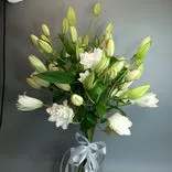 Фото флориста 4: Букет из 11 белых лилий «Агния»