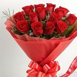 Маленькое фото 3: Букет из 15 красных роз в розовой пленке