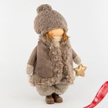 Маленькое фото 2: Сувенир Мальчик в дубленке, Н44х30,5х20см, коричневый
