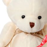 Маленькое фото 5: Игрушка «Медведь с бантом», 25 см, кремовый, якоря