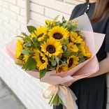Маленькое фото 1: Букет из 11 желтых подсолнухов в упаковке